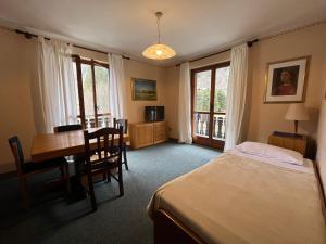 Postel nebo postele na pokoji v ubytování San Luigi - Rooms & Apartments