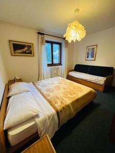 Postel nebo postele na pokoji v ubytování San Luigi - Rooms & Apartments