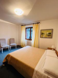 Postel nebo postele na pokoji v ubytování San Luigi - Rooms & Apartments