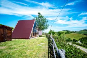 a house on a hill with a fence at La Luna sul Trebbio in Modigliana +34 photos