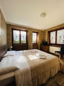Postel nebo postele na pokoji v ubytování San Luigi - Rooms & Apartments