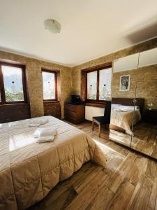 Postel nebo postele na pokoji v ubytování San Luigi - Rooms & Apartments