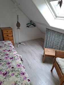 Fotografie z fotogalerie ubytování Gezellig vakantiehuisje op loopafstand van de duinen en het betoverende Egmondse strand v destinaci Egmond aan Zee