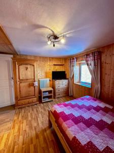 Ένα ή περισσότερα κρεβάτια σε δωμάτιο στο Appartement confortable à Gérardmer 40 m² proximité pistes