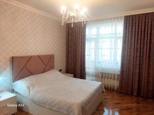 Postel nebo postele na pokoji v ubytování Luxury Guest House