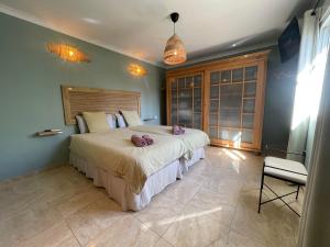 Posteľ alebo postele v izbe v ubytovaní Beach house 'Tiempo Lento'