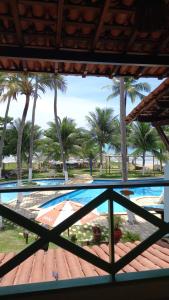 A piscina localizada em Albacora Praia Hotel ou nos arredores
