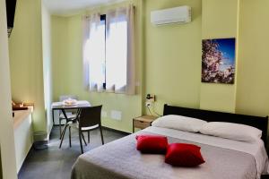 Postel nebo postele na pokoji v ubytování Le Tre Punte B&B