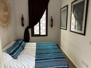 Letto o letti in una camera di Riad Hugo