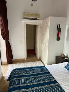 Letto o letti in una camera di Riad Hugo
