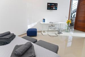 TV a/nebo společenská místnost v ubytování Luxury Villa Punta Mujeres