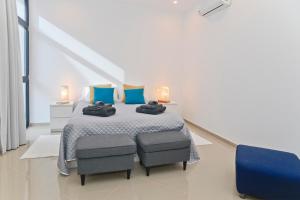 Postel nebo postele na pokoji v ubytování Luxury Villa Punta Mujeres + 37 fotografií