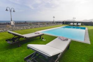 Bazén v ubytování Luxury Villa Punta Mujeres nebo v jeho okolí