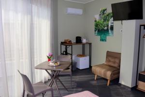 TV a/nebo společenská místnost v ubytování Le Tre Punte B&B