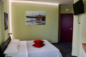 Postel nebo postele na pokoji v ubytování Le Tre Punte B&B