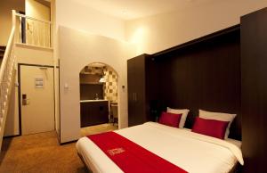 Postel nebo postele na pokoji v ubytování Van der Valk Hotel Avifauna