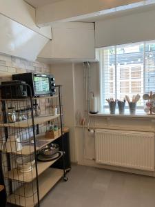 Dapur atau dapur kecil di Appartement 't Souterrain