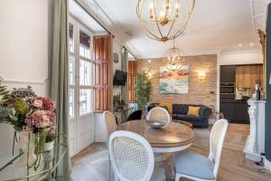 A seating area at CH Elvira Luxury Apartment
