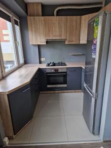 Η κουζίνα ή μικρή κουζίνα στο Apartament W18 Mieszkanie dla Wszystkich