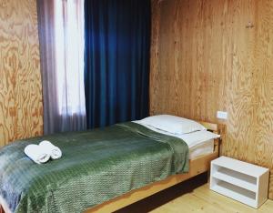 Rúm í herbergi á A North Homestay