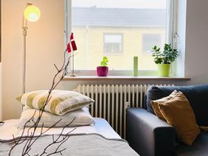Postel nebo postele na pokoji v ubytování Randers residence Sankt Andreas - 2 room apartment