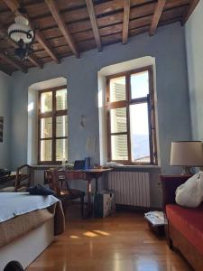 Postel nebo postele na pokoji v ubytování Dimora Da Feliciano bellezza, tanto spazio e tranquillità nella collina torinese