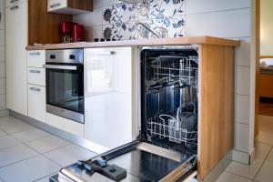 Кухня или мини-кухня в Apartments Stare Brajde
