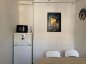 Kuchyň nebo kuchyňský kout v ubytování Poppy Flower Apartment