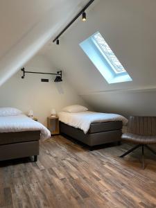 Postel nebo postele na pokoji v ubytování B&B Sint-Mariaburg