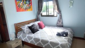 Postel nebo postele na pokoji v ubytování Guest House Blue Andaman