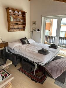 Postel nebo postele na pokoji v ubytování Dachwohnung mit Charme im Haus Luchre, Zermatt