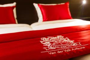 Postel nebo postele na pokoji v ubytování Van der Valk Hotel Avifauna