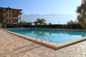 a swimming pool in the middle of a building at Casa Carlotta in Tignale