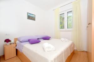 Postel nebo postele na pokoji v ubytování Holiday Home Paradiso