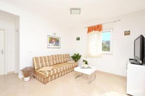 TV a/nebo společenská místnost v ubytování Holiday Home Paradiso