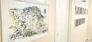 a painting of a map hanging on a wall at B & B LuVì in Vibo Valentia
