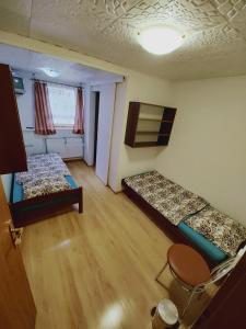 Postel nebo postele na pokoji v ubytování Motel Šofér