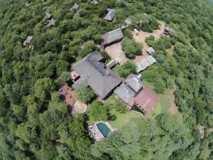 an aerial view of a large house with trees at Grand Kruger Lodge and Spa in Marloth Park