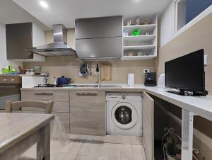 Kuchyň nebo kuchyňský kout v ubytování Casa vacanza Terra Mare