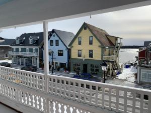 a view of a town from a balcony at Kennedy House in Saint Andrews