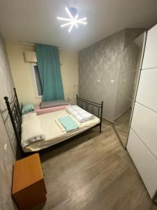 Postel nebo postele na pokoji v ubytování Appartamento Il Melograno