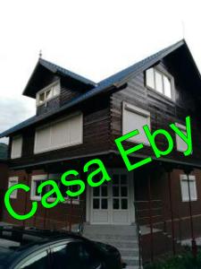 a house with the words cisco ev in front of it at Casa Eby in Vidolm