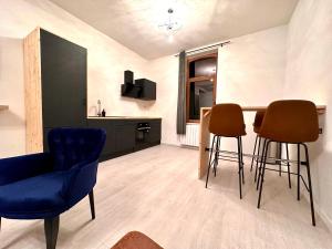 Μια τηλεόραση ή/και κέντρο ψυχαγωγίας στο La Little House de Dinant - Esc'Appart