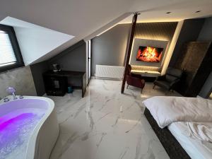 Postel nebo postele na pokoji v ubytování BALA HOTEL