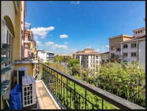 a balcony with a view of a city at 3 Bedroom in Tuscany Private Estate BGC in Manila