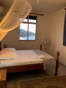 Postel nebo postele na pokoji v ubytování Chez Antonin