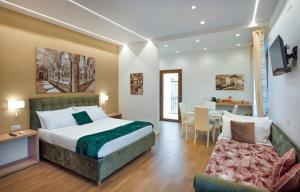 A bed or beds in a room at Cuore di Sorrento Suites