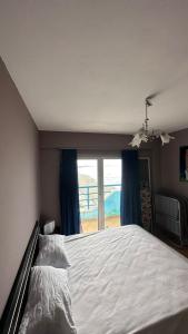 Postel nebo postele na pokoji v ubytování Sea view apartment 1