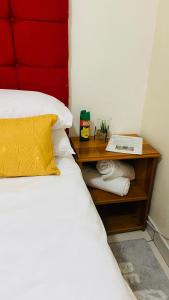 Ein Bett oder Betten in einem Zimmer der Unterkunft Dundee Bun Private Room