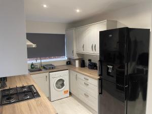 Kuchyň nebo kuchyňský kout v ubytování Campion lodge